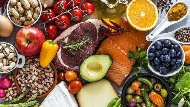 An array of meat, fish, nuts, fruit and vegetables