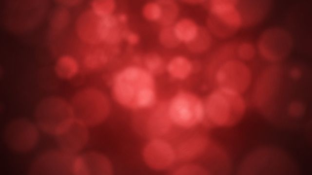 Blurry red dots.