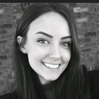 A greyscale photograph of Lucy Lawrence